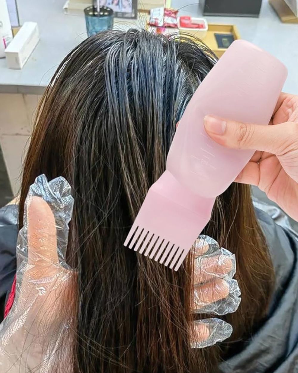 Distributore Olio Capelli
